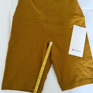 Lululemon Women’s Nulu Align size 4. Gold spice color. 8” NWT